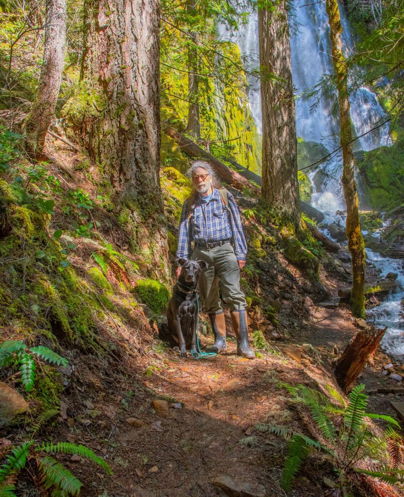 Matt and Odee on a sun dappled trail.